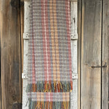 Dūmakaini bordo/pelēki rūtains aitas vilnas pleds ar bārkstīm 150X210cm