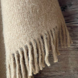 Karameļu brūna toņa garais 100% vilnas pončo ar kapuci un bārkstīm