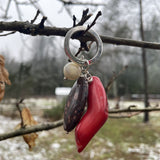 Atslēgu piekariņš ar dažādiem akmeņiem